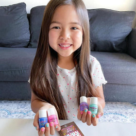 Piggy Paint nail polish drying with hair dryer