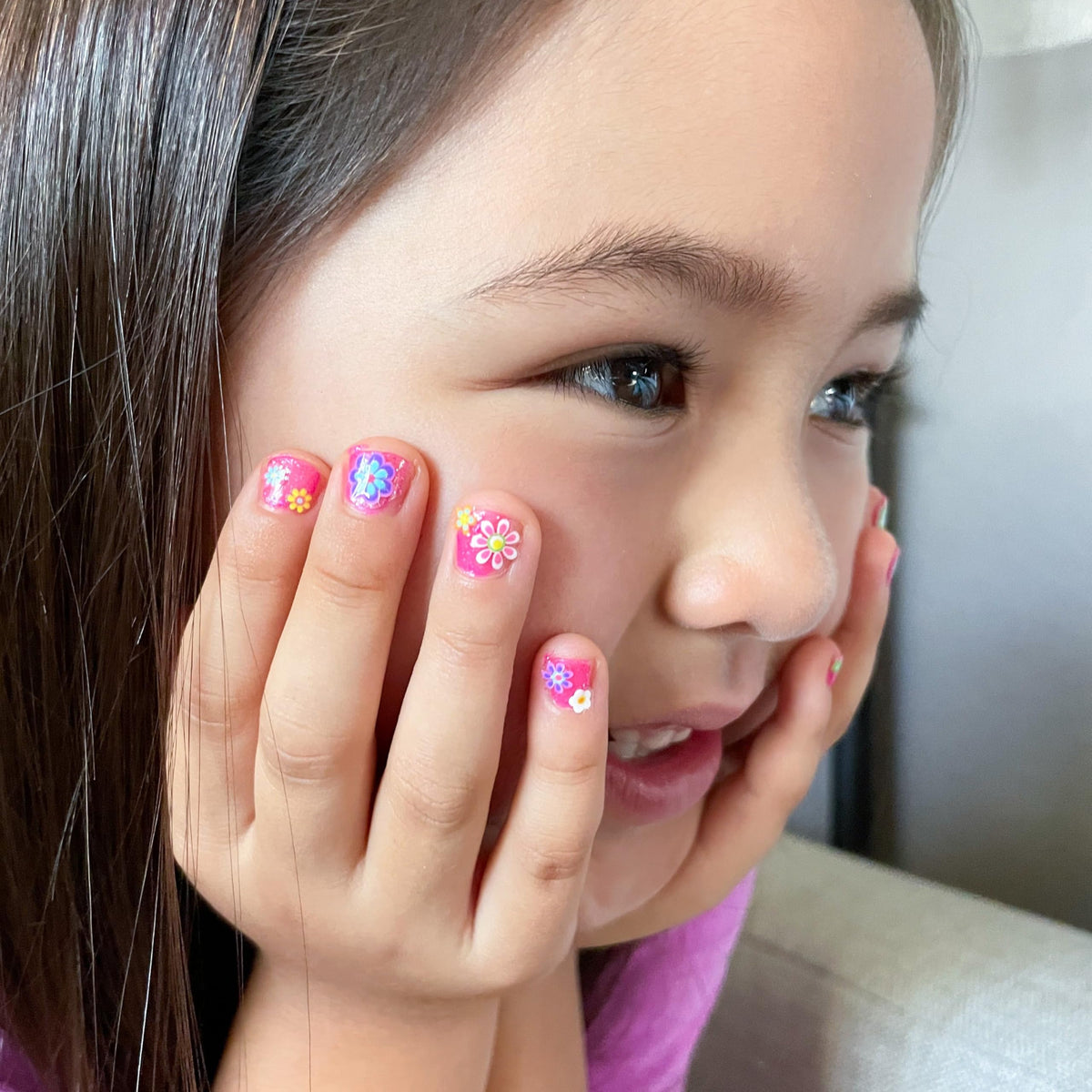 Piggy Paint Shimmery Pink Nail Polish in use during playtime