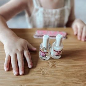 Piggy Paint Shine Topcoat in use on kids' nails