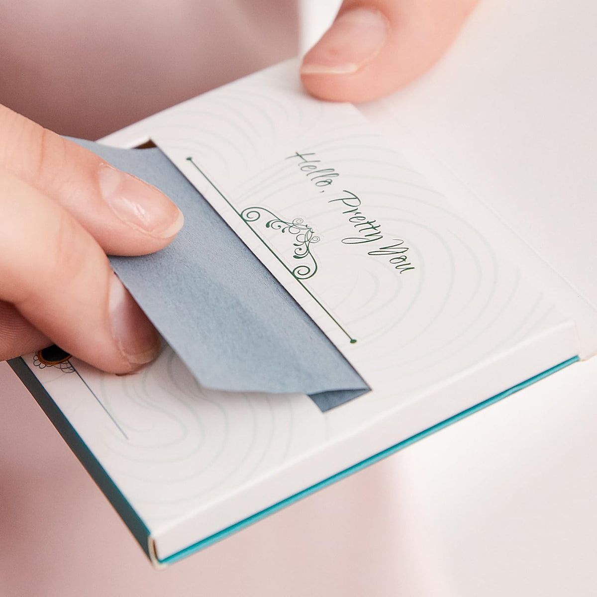 PleasingCare blotting sheets showing bamboo charcoal material