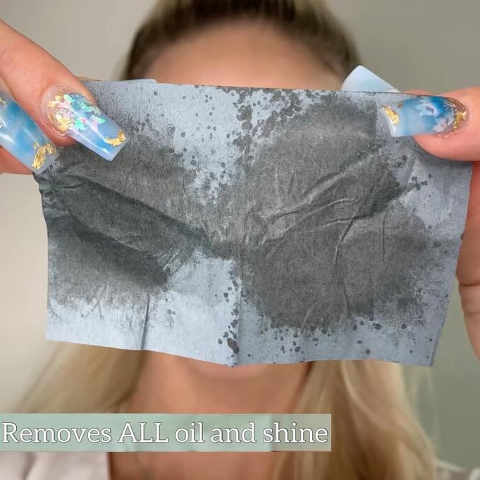 PleasingCare Large Face Oil Blotting Sheets being pulled from dispenser