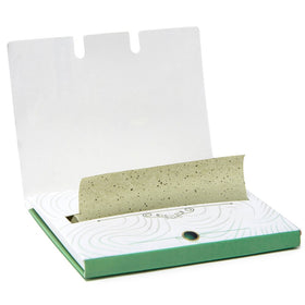 PleasingCare Oil Blotting Sheets in a purse
