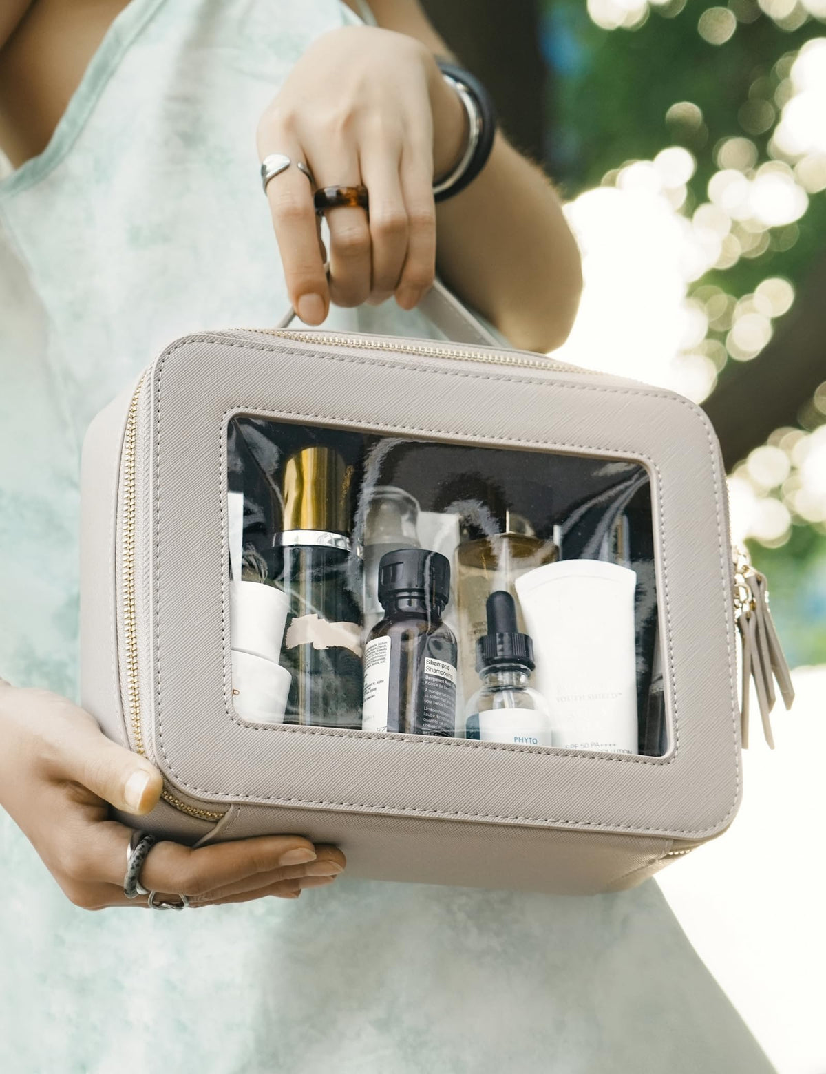 Popvibe Clear Makeup Bag on a travel suitcase