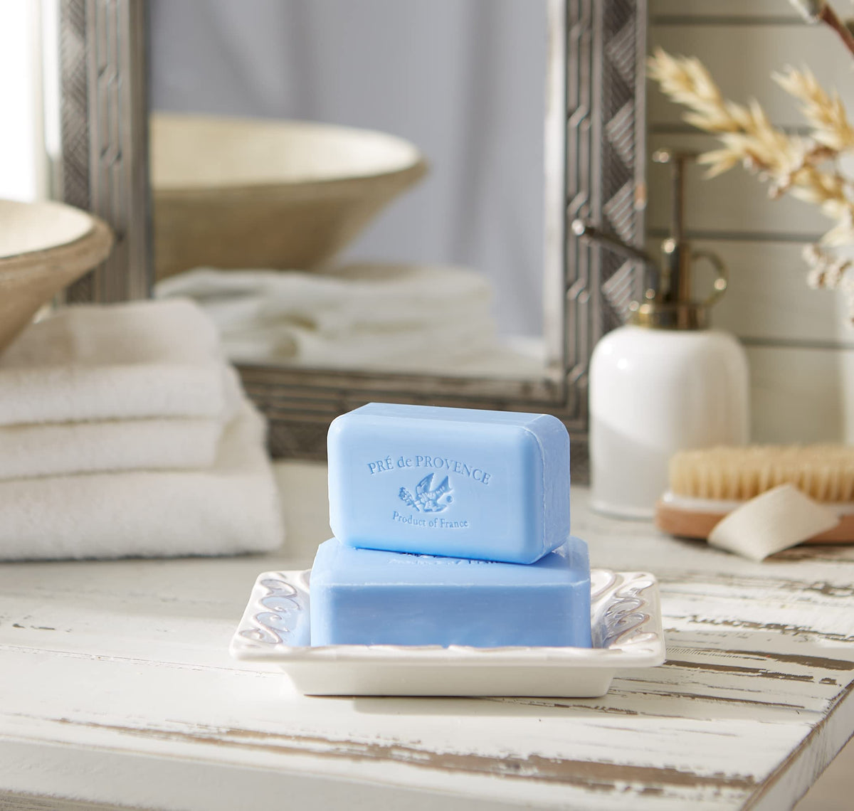 Pre de Provence Artisanal Soap Bar Starflower on a bathroom sink