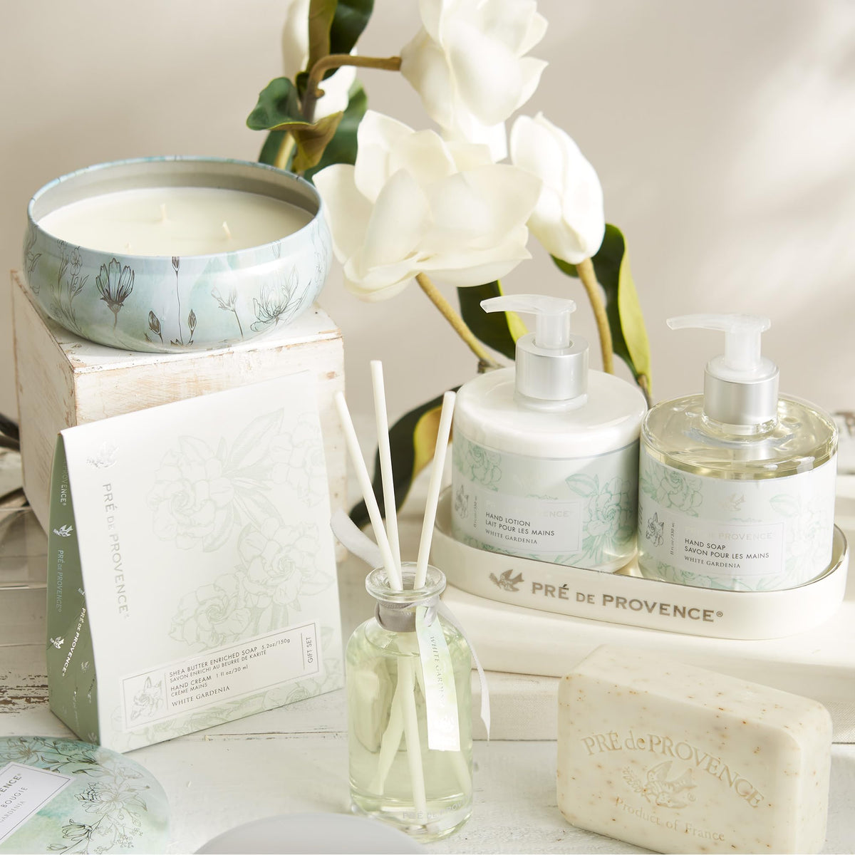 Pre de Provence White Gardenia Soap Bar with floral background