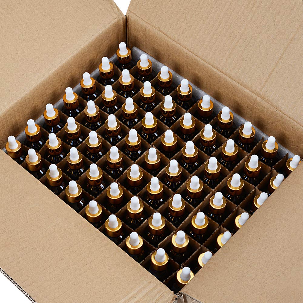 PrettyCare dropper bottles on a wooden surface