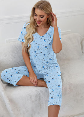 PrinStory Womens Pajama Set laid out flat on a bed