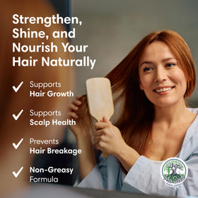 ProSeed Wheat Germ Oil 4oz with a hand applying the oil