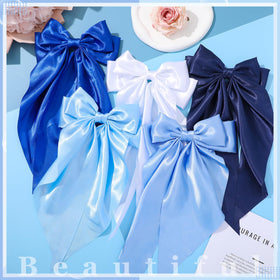 ProSuites hair bows worn by a model in a casual setting