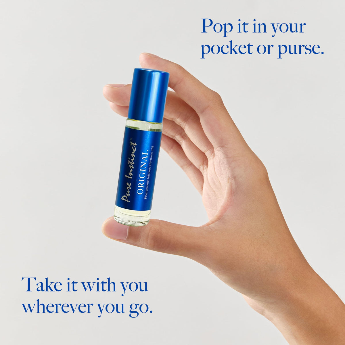 Pure Instinct Roll-On Pheromone Perfume on a bathroom counter