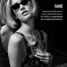 Rabanne Fame Parfum displayed on a vanity