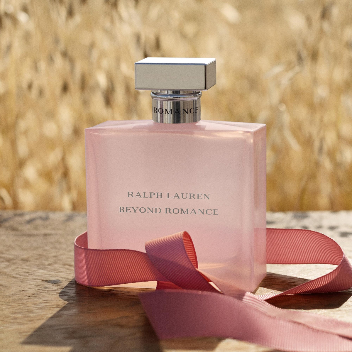 RALPH LAUREN FRAGRANCES Beyond Romance Eau de Parfum bottle with flowers