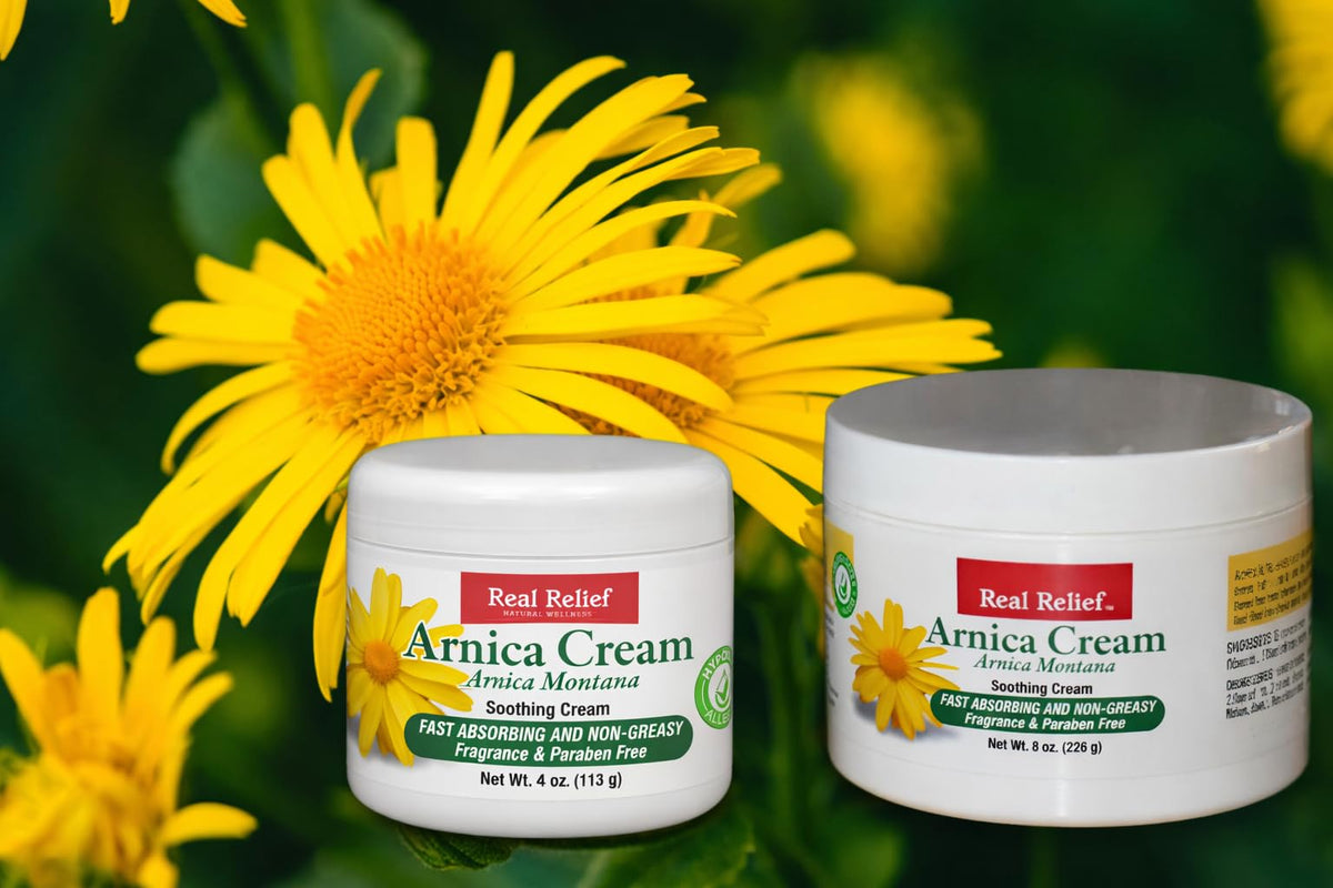 Real Relief Arnica Cream being applied to arm