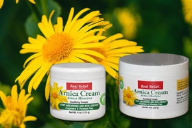 Real Relief Arnica Cream being applied to arm