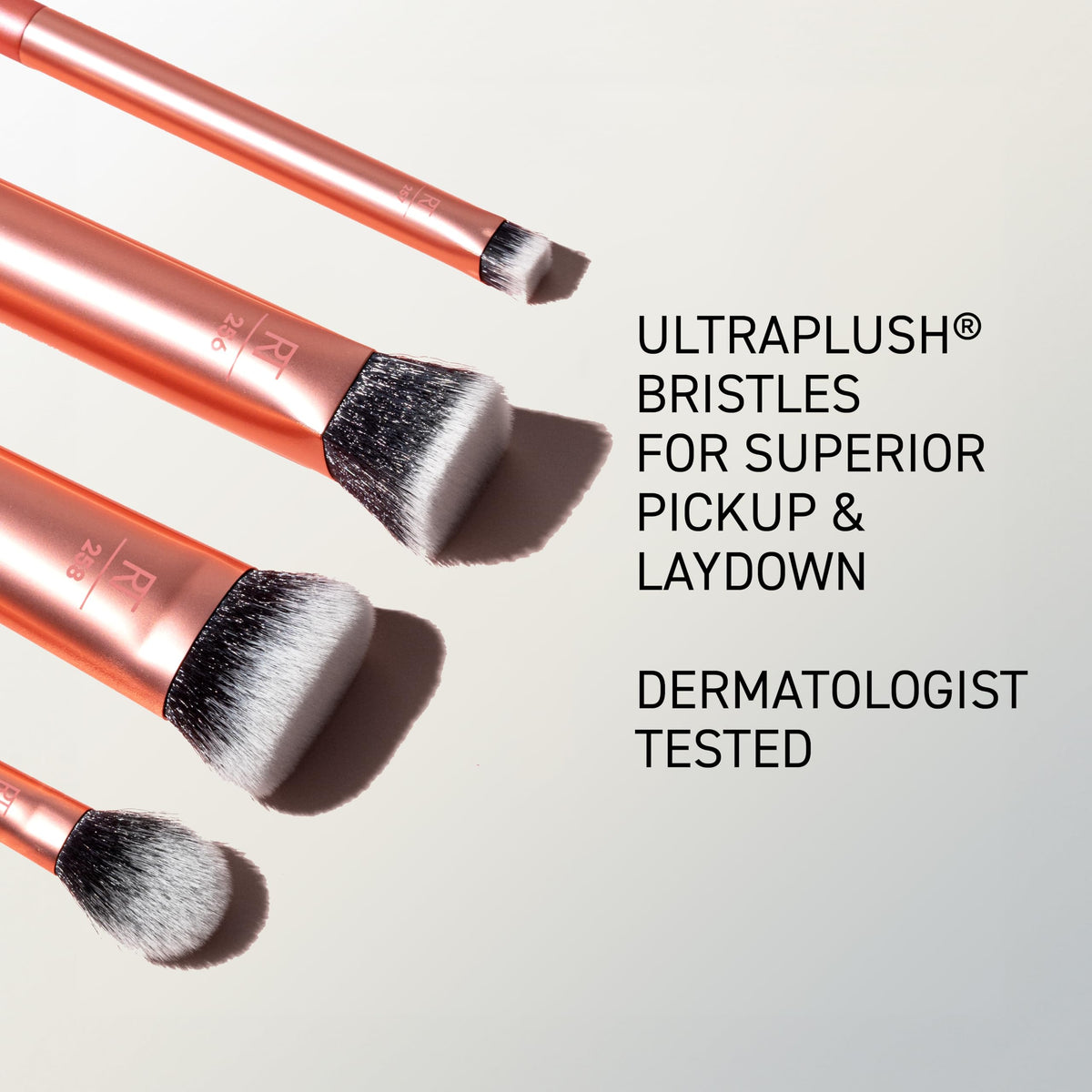 Real Techniques Face Base Set brushes on a vanity