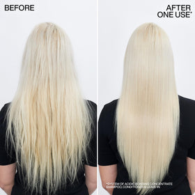 Redken Acidic Bonding Concentrate Conditioner showing thick consistency