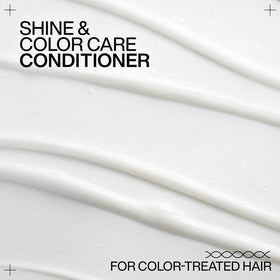 Redken Acidic Color Gloss Conditioner in bathroom setting