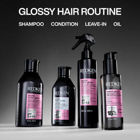 Redken Acidic Color Gloss Shampoo in a bathroom setting