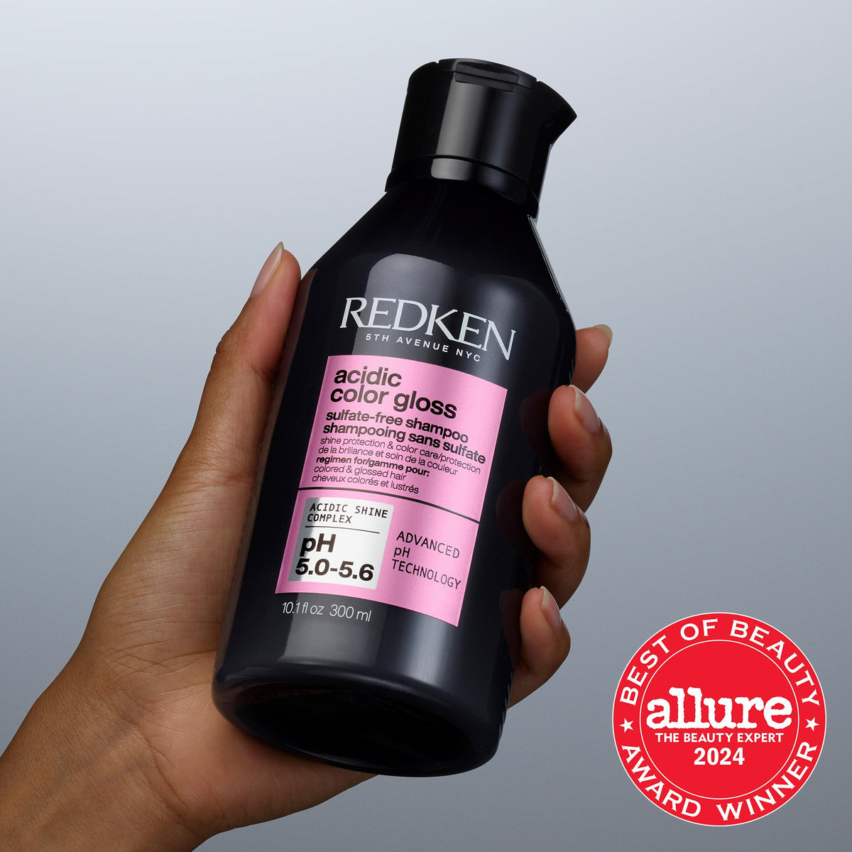 Redken Acidic Color Gloss Shampoo in bathroom setting