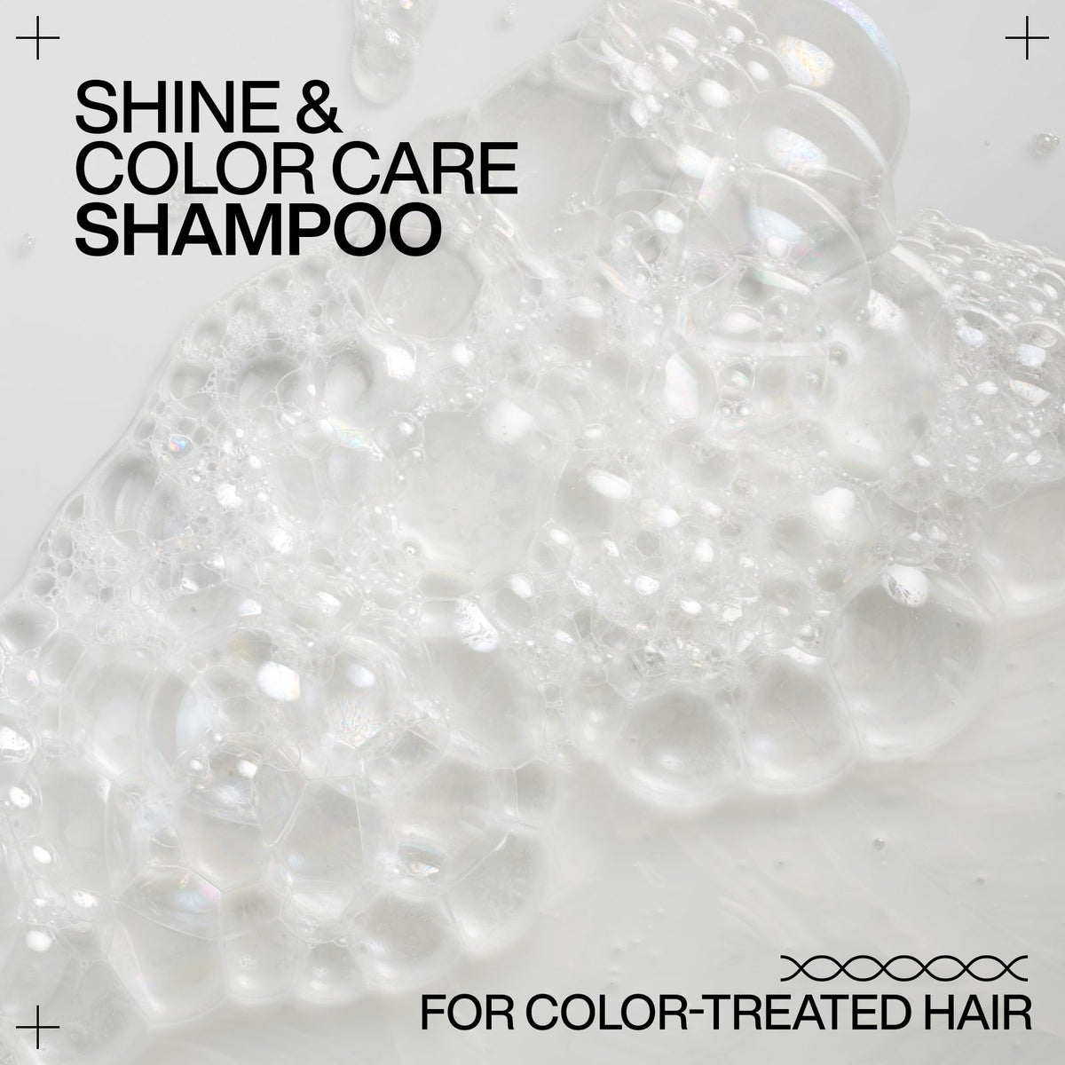 Redken Acidic Color Gloss Shampoo on a vanity table