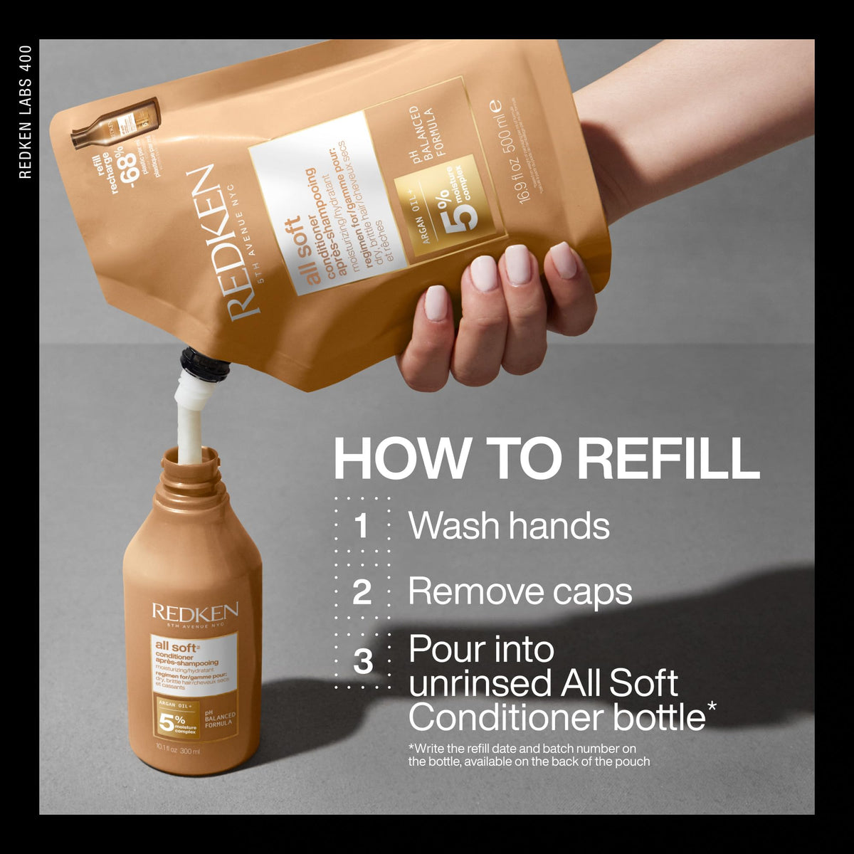 Redken All Soft Conditioner 495g showing texture on hand