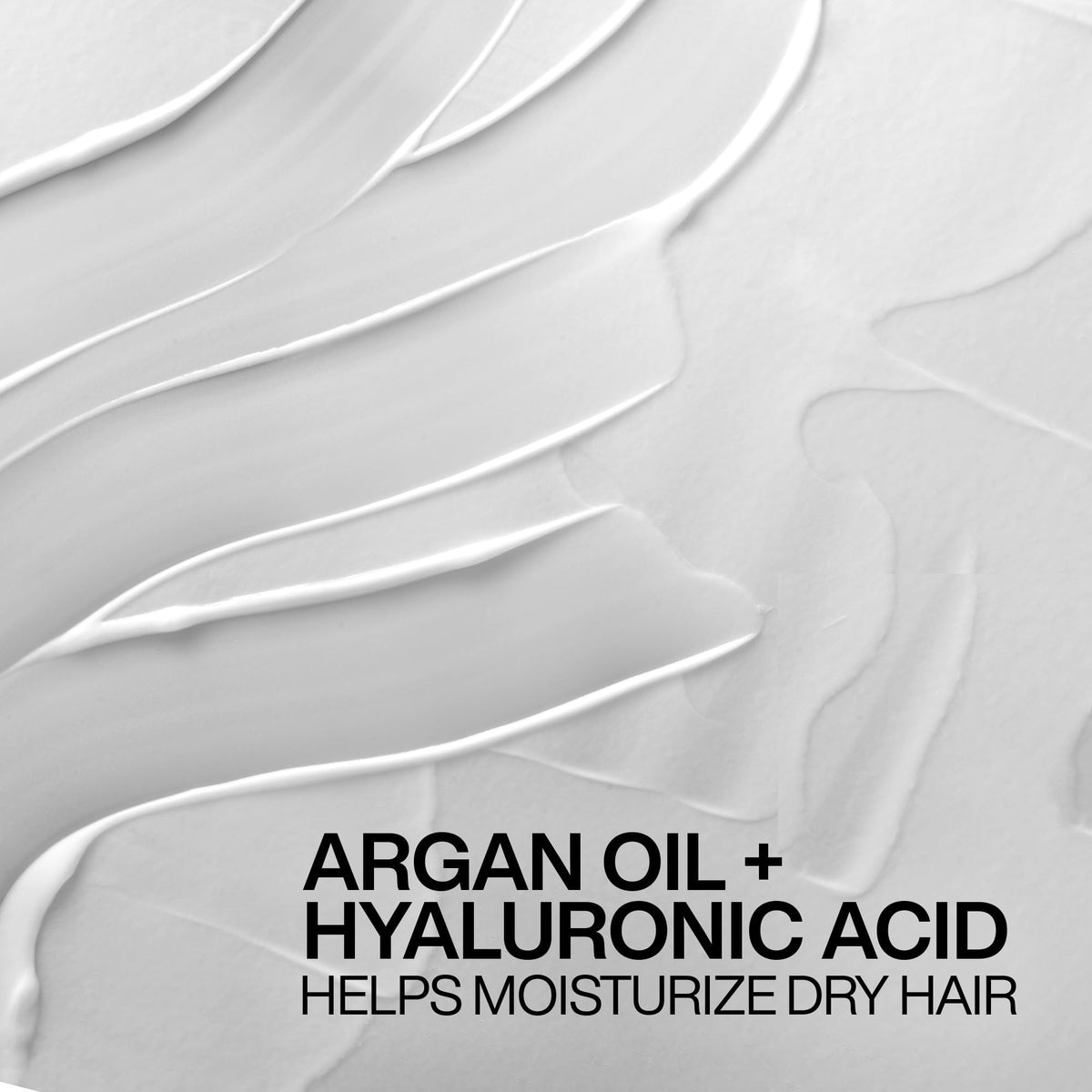 Redken All Soft Leave-In Conditioner application on hair
