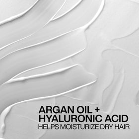 Redken All Soft Leave-In Conditioner application on hair