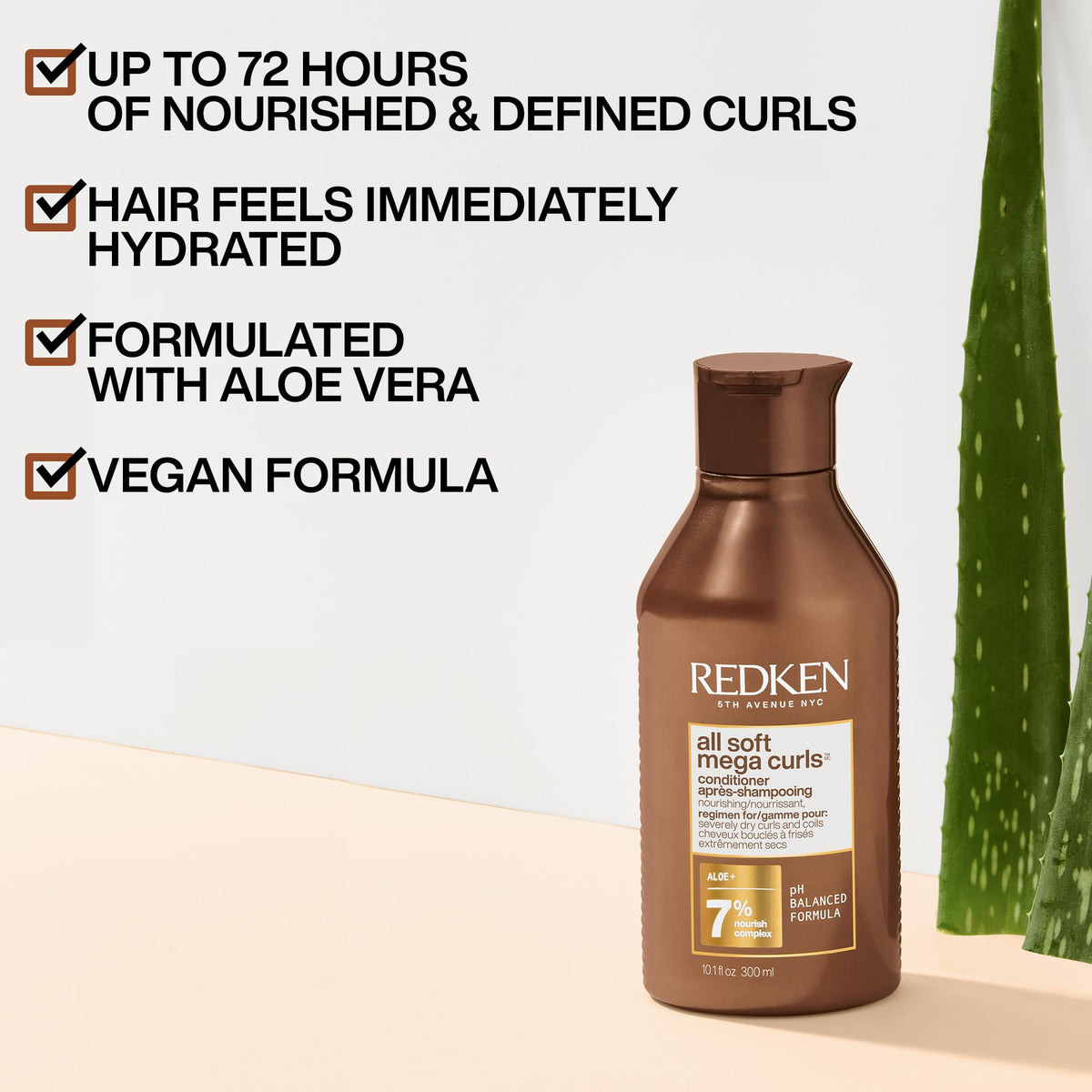 Redken All Soft Mega Curls Conditioner texture on hand