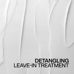 Redken Frizz Dismiss Rebel Tame Leave-In Cream with hair styling tools