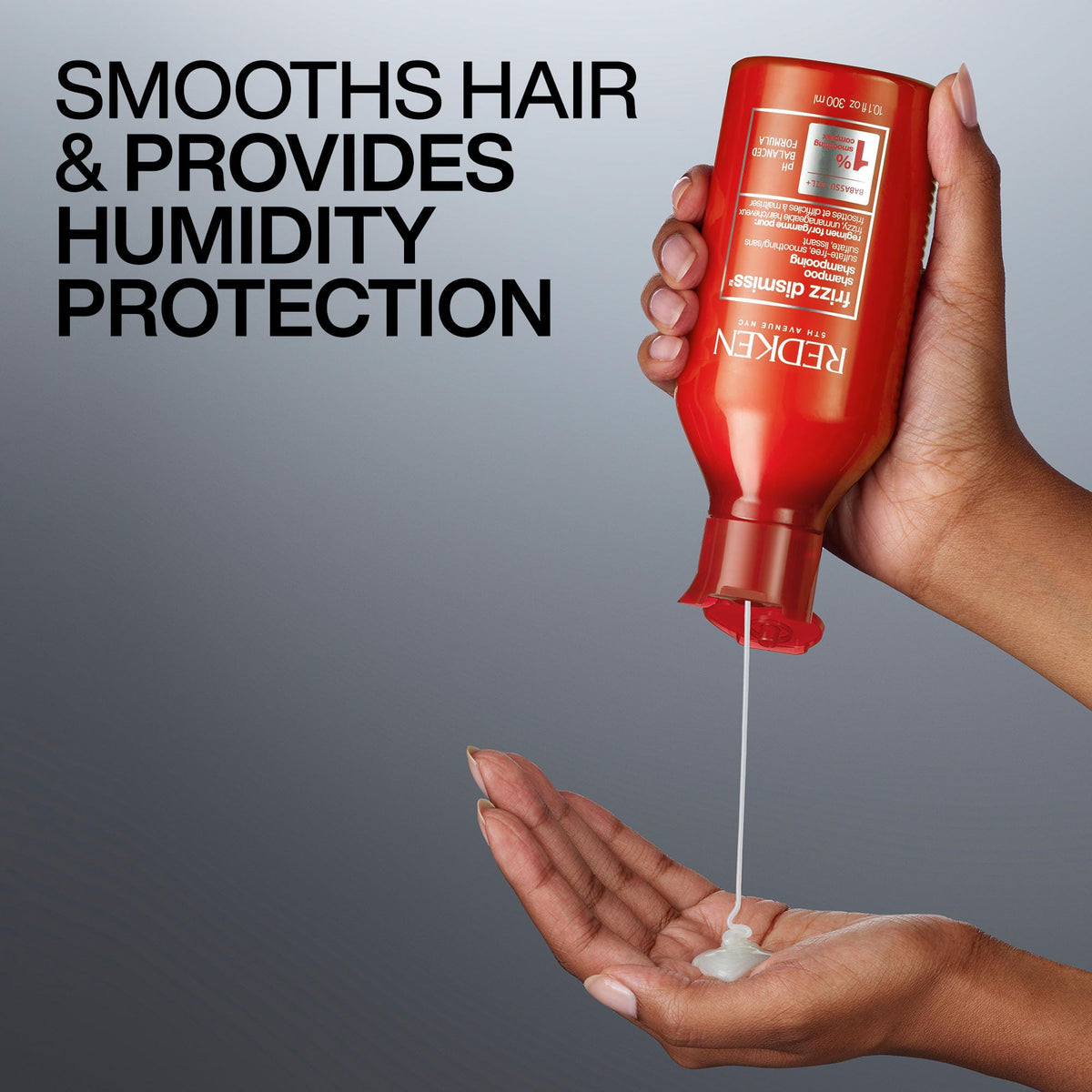 Redken Frizz Dismiss Shampoo in a bathroom setting