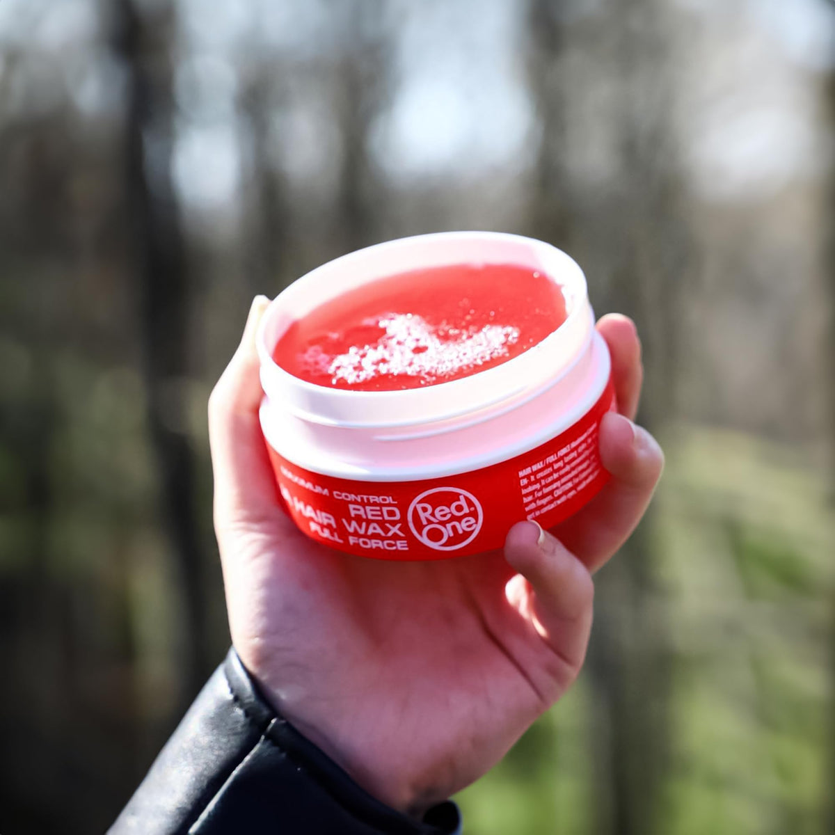 Redone Aqua Hair Wax 150ml Red in a bathroom setting