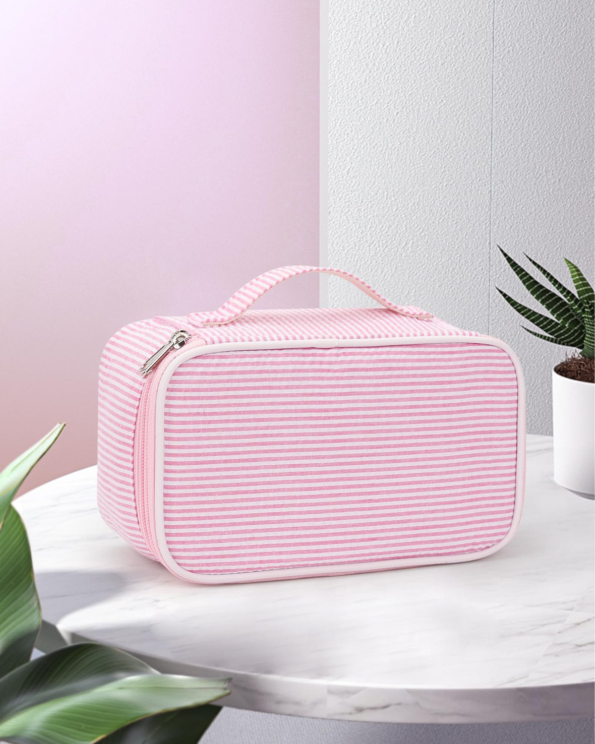 Relavel Pink Makeup Bag in a backpack for travel