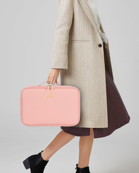 Relavel Travel Makeup Bag displayed on a vanity