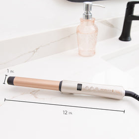 Remington Shine Therapy Curling Wand 1 Inch in use on hair