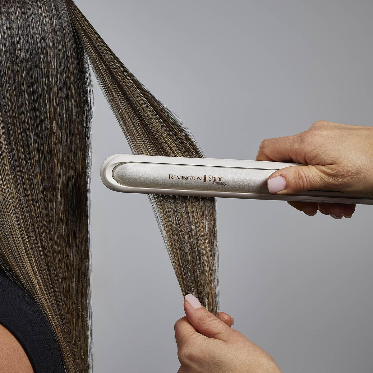 Remington Shine Therapy Hair Straightener with Argan oil bottle