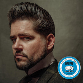 REUZEL Blue Pomade 95g jar against a neutral background