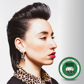 REUZEL Green Grease Pomade 110g on a wooden table