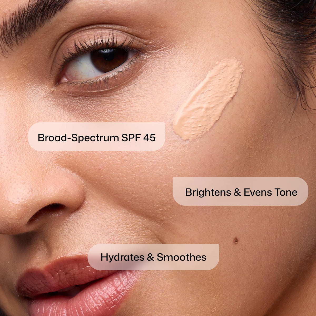 Revision Skincare Intellishade Original SPF 45 tinted moisturizer application on face