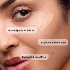 Revision Skincare Intellishade Original SPF 45 tinted moisturizer application on face