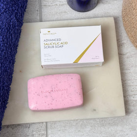 REVITALE soap displaying its exfoliating properties