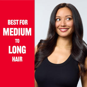 REVLON One-Step Volumizer in use on hair