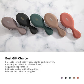 RHOS Mini Hair Brush displayed on a bathroom counter