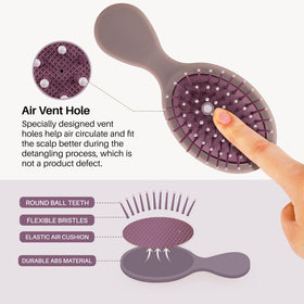 RHOS Mini Hair Brush held in hand for ergonomic view