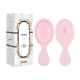 RHOS Mini Hair Brush in pink, front view