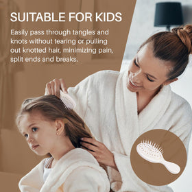 RHOS Mini Hair Brush with flexible comb teeth close-up