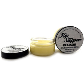 Rip Stopper Balm on athlete's hands after workout