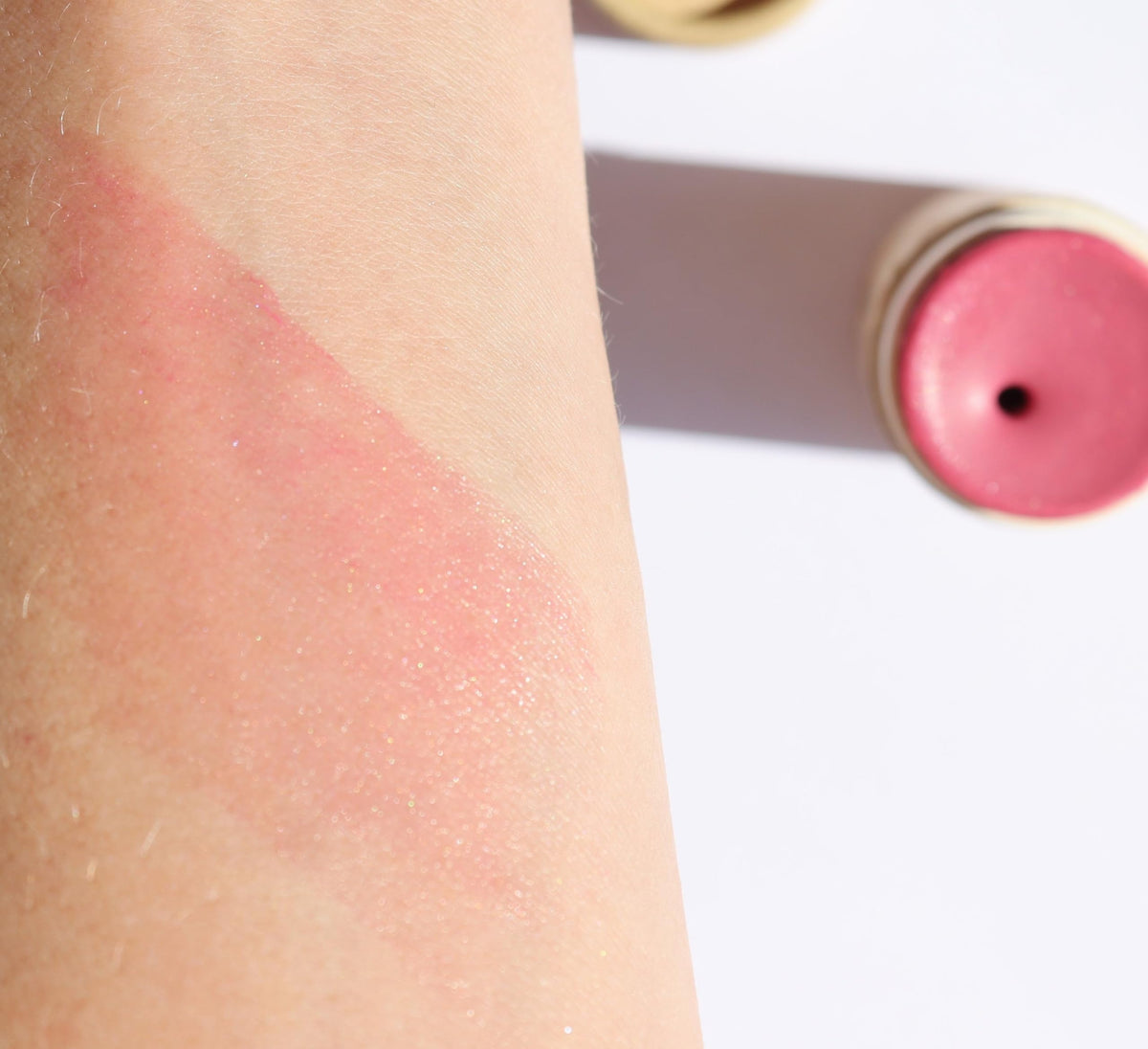 River Organics Cream Blush Stick Bloom Light Pink swatch on skin