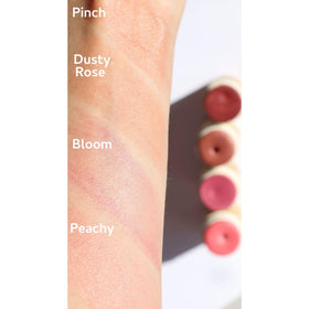 River Organics Cream Blush Stick Pinch on makeup table