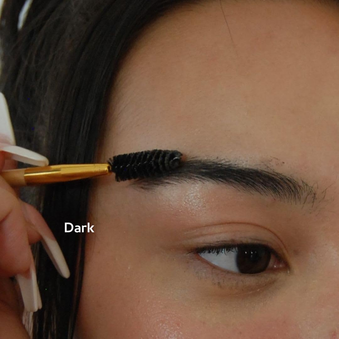 River Organics Dark Brow Wax brush applicator close-up