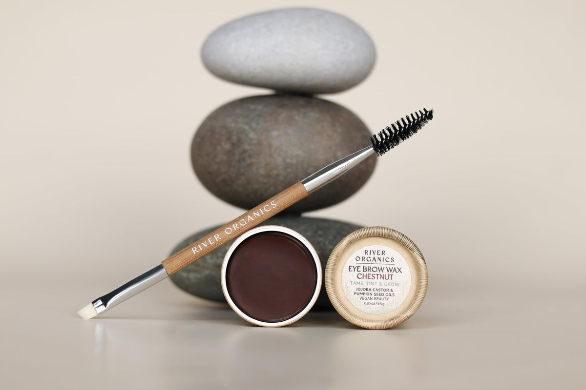 River Organics Dark Brow Wax in a natural setting